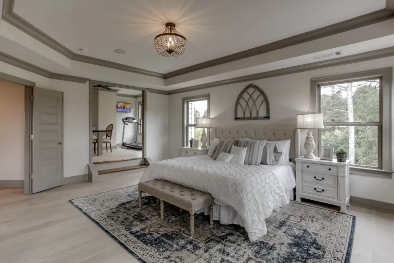 CAD Home Crafters & Designs - Builder for custom homes Craftsman style home in Rockingham County, NC, Master wing with 12' ceiling bedroom, tray ceilings, chandelier, and beautiful view of the scenic Rockingham County landscape
