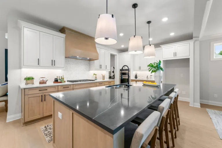 CAD Home Crafters & Designs - Builder for custom homes Craftsman style home in Rockingham County, NC, custom millwork in the kitchen and large oversized marble countertops