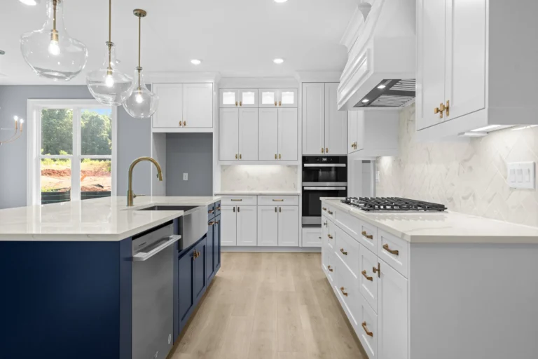 CAD Home Crafters & Designs - Builder for custom homes Craftsman style home in Rockingham County, NC, large custom designed kitchen with stainless steel farmhouse sink